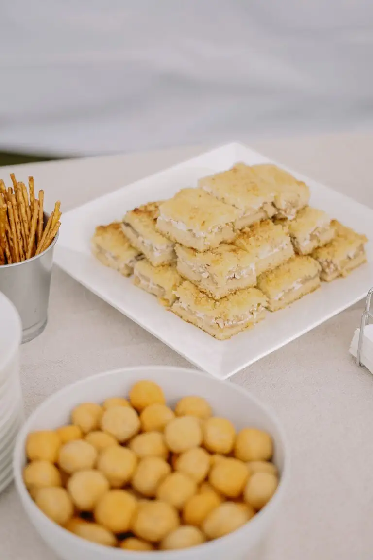 Delicious snacks including cheese cubes and pretzels, perfect for parties or gatherings.