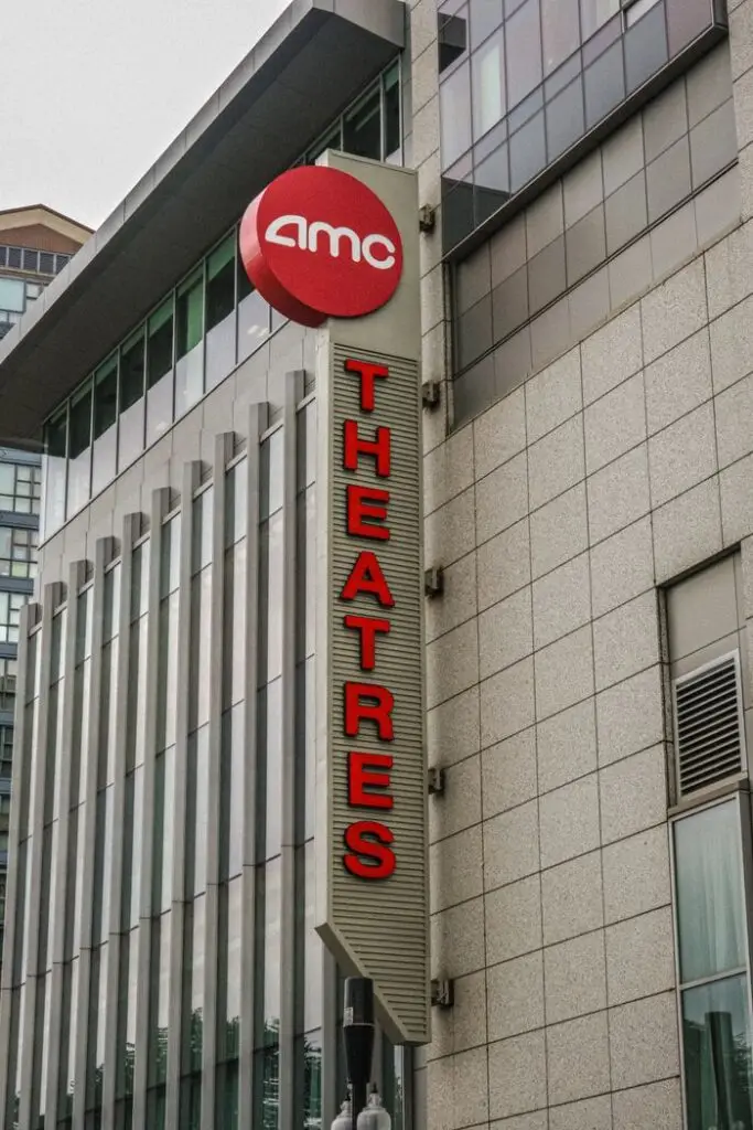 Vertical shot of AMC Theatres sign on building facade in Boston, MA.